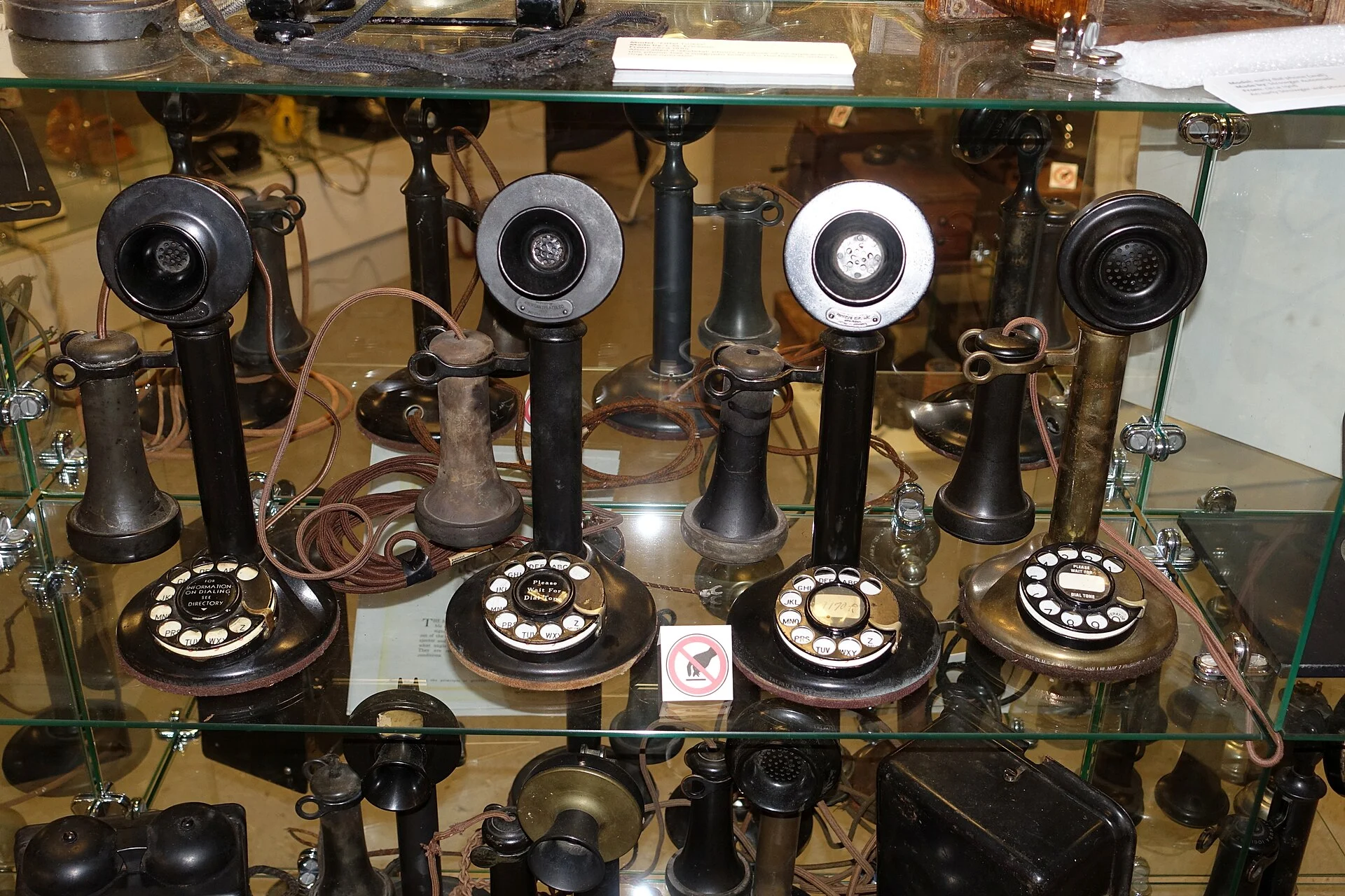 Antique candlestick telephones on display at the Telephone Museum in Waltham, Massachusetts